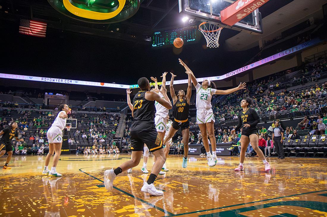 Ducks forward Sarah Rambus (23) blocks a shot from Golden Devils guard Zaay Green (00.)&#160;The Oregon Women&#8217;s Basketball team beat the Arkansas-Pine Bluff Golden Lions, 86-60, at Matthew Knight Arena in Eugene, Ore., on Nov. 8, 2023. (Eliott Coda/Emerald)