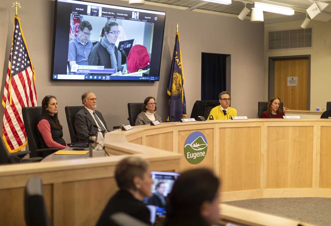 The Eugene City Council listens to comments provided by community members at the Nov. 27 city council meeting. At the beginning of the meeting, Eugene mayor Lucy Vinis and Ward 8 representative Randy Groves voiced their support for a resolution calling for a ceasefire. "A resolution from this council can be a powerful reassertion of values that this council has expressed in earlier resolutions in support of peace and in opposition to hate," Vinis said. "We have a moment to stand for peace, with clarity about the depth of pain and the challenge of compromise that is required. We should all do so with clear heads and honest hearts." (Alex Hernandez/Emerald)