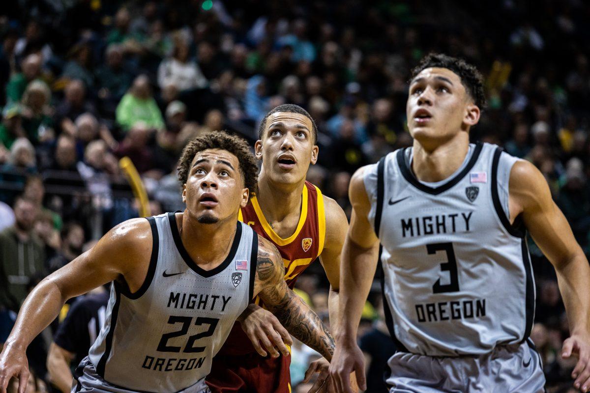 Players fight for positioning to gather the potential rebound off an Oregon free throw.&#160;The Oregon Men's Basketball Team host the USC Trojans to start their last season of conference play in the PAC-12 &#160;at Matthew Knight Arena in Eugene, Ore., on Dec. 28, 2023. (Jonathan Suni/Emerald)