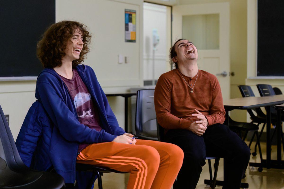 Meeting attendees laugh as a funny story is shared in the group. The University of Oregon Mindfulness Club held its final meeting before Thanksgiving break at Anstett Hall on the University of Oregon campus in Eugene, Ore., on Nov. 22, 2023. (Eric Becker/Emerald)