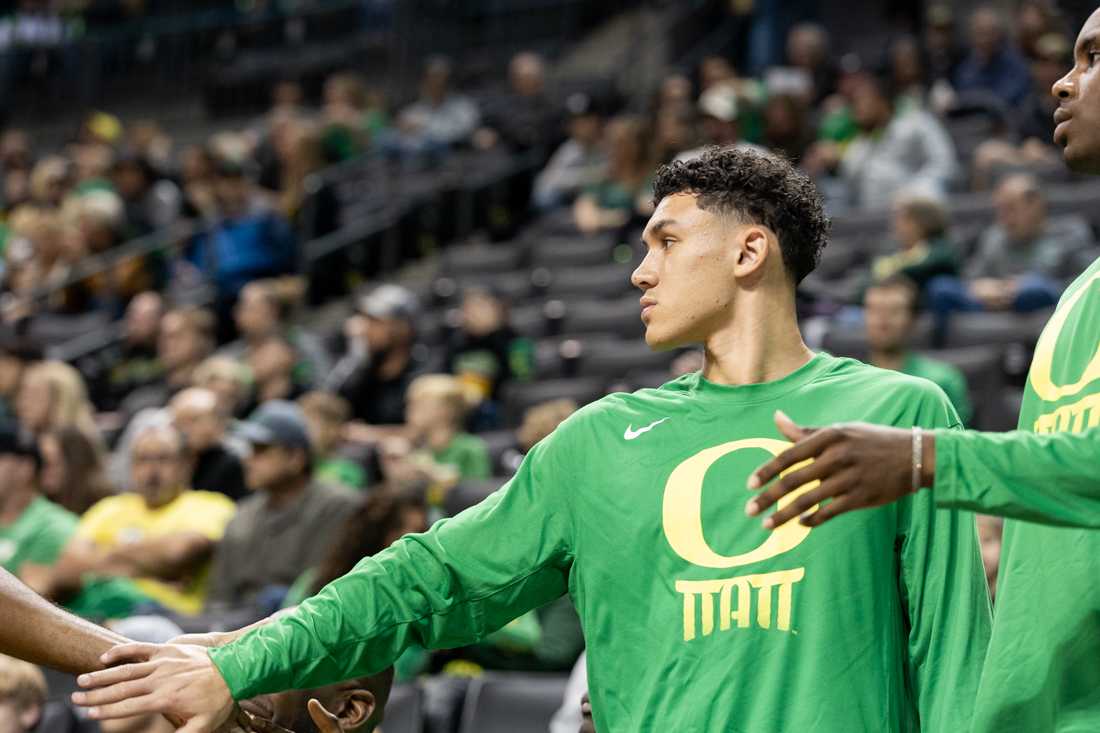 Jackson Shelstad (3) high fives his teammates as they come out of the game. The University of Oregon Ducks Men&#8217;s Basketball team defeated the Tennessee State Tigers 92-67 at Matthew Knight Arena in Eugene, Ore., on Nov. 17, 2023. (Kemper Flood/ Emerald)