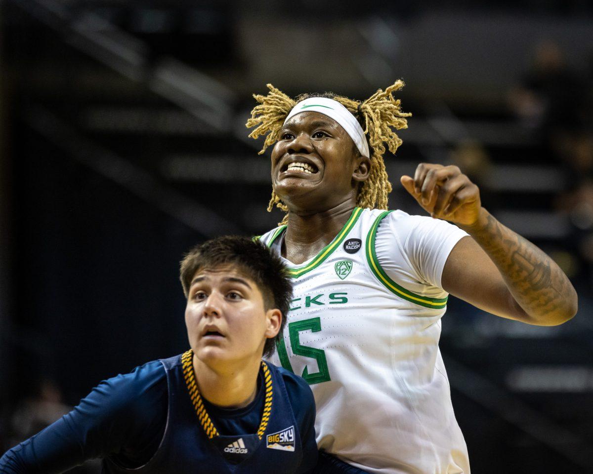 Phillipina Kyei (15) watches her shot hit the rim and bounce out to get rebounded by the opposing team.&#160;&#160;The Oregon&#160;Women's&#160;Basketball team host Northern Arizona for their season opener &#160;at Matthew Knight Arena in Eugene, Ore., on Nov. 6, 2023. (Jonathan Suni, Emerald)