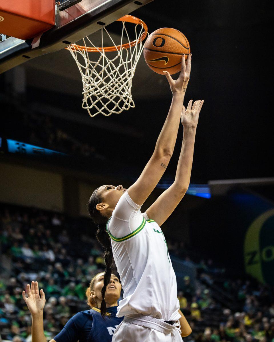 Kennedy Basham (1) rises up for an easy reverse layup that gets the Duck bench and fans up and out of their seats and yelling.&#160;&#160;The Oregon&#160;Women's&#160;Basketball team host Northern Arizona for their season opener &#160;at Matthew Knight Arena in Eugene, Ore., on Nov. 6, 2023. (Jonathan Suni, Emerald)