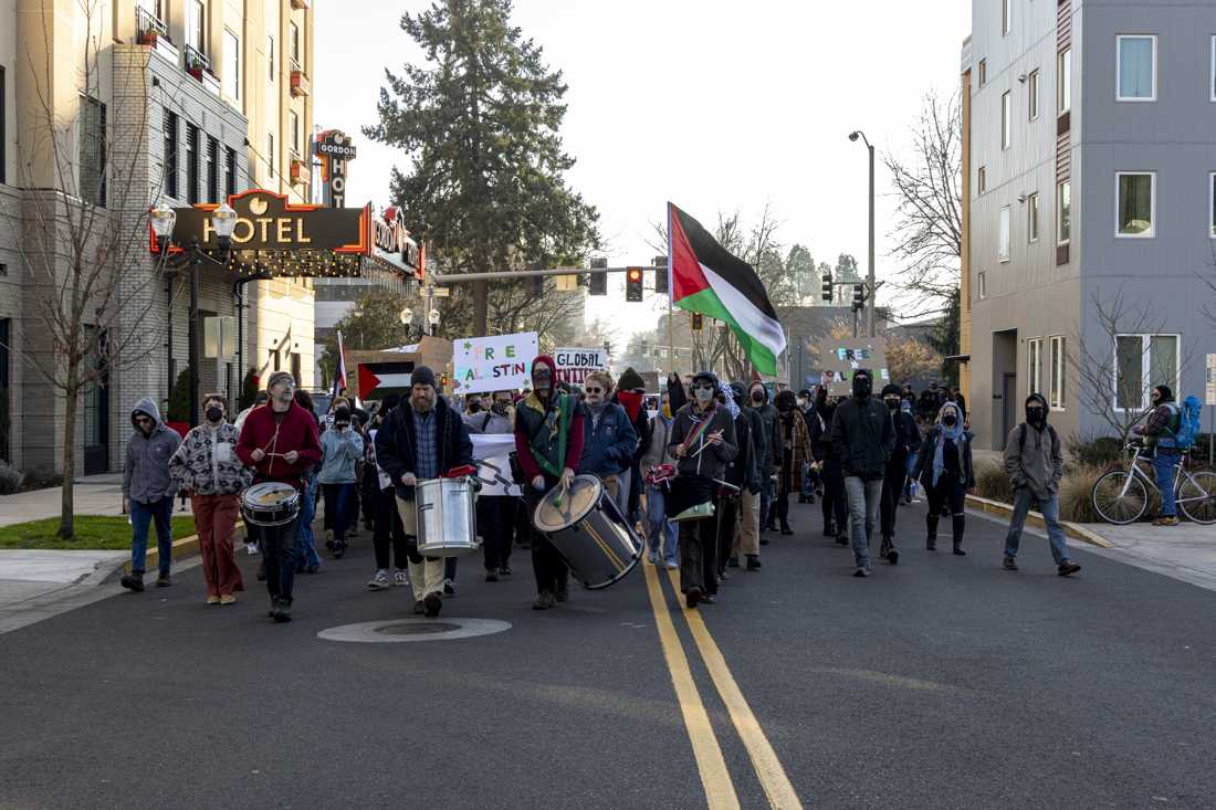 <p>Protesters marched from the Wayne L. Morse U.S. Courthouse through Eugene on Dec. 16 in support of a “global intifada”— a controversial phrase calling for global resistance and referencing past Palestinian uprisings against Israel. (Alex Hernandez/Emerald)</p>