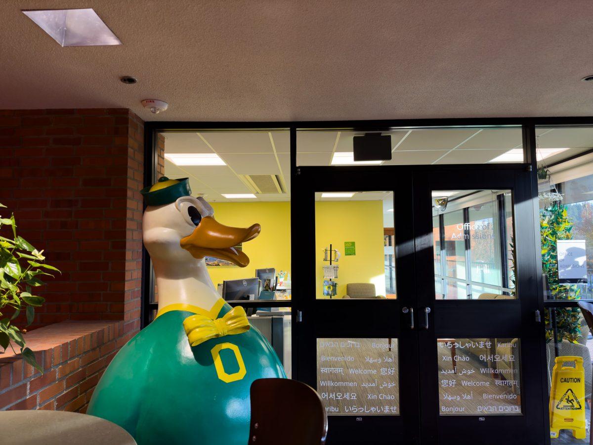 An Oregon Duck statue sits outside of the doors of the Admissions Office. The Admissions Office of The University of Oregon is located in Oregon Hall on Agate St. in Eugene, Ore. (Sebastian Flores/Emerald)