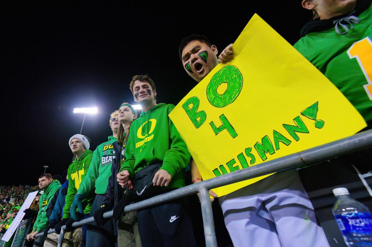 Signs supporting Oregon QB Bo Nix's Heisman Trophy campaign were a common sight in the stands. The University of Oregon Ducks Football team defeated Oregon State University 31-7 in a home match at Autzen Stadium in Eugene, Ore., on Nov. 24, 2023. (Eric Becker/Emerald)