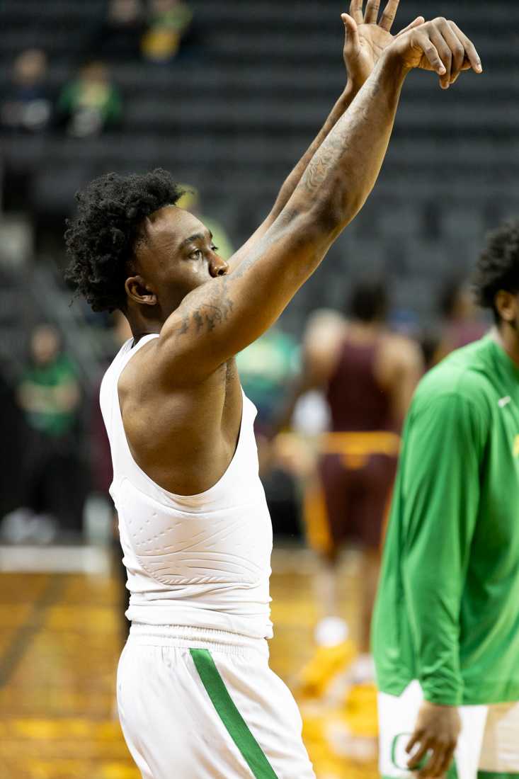 Jermaine Couisnard (5) warms up before the start of the game. The University of Oregon Men&#8217;s Basketball team beat the Arizona State Sun Devils 80-61 at Matthew Knight Arena in Eugene, Ore., on Jan. 25, 2024. (Kemper Flood/ Emerald)