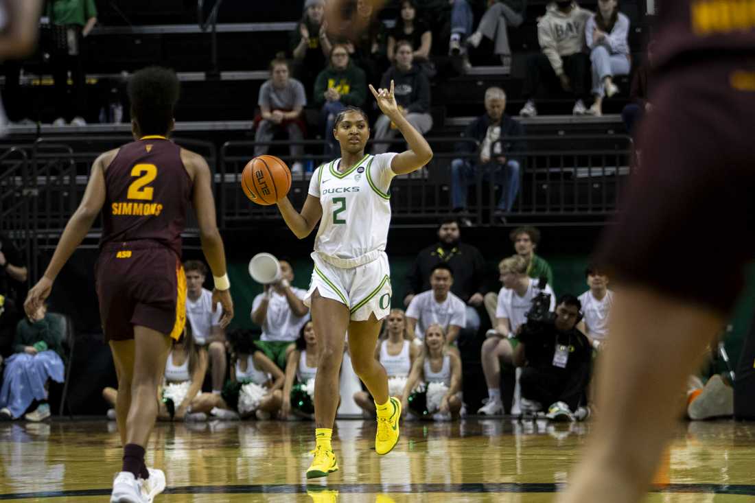 Oregon guard Chance Gray (2) signals a play as she dribbles down the court. The Oregon Women's Basketball Team won 65-53 against the Arizona State Sun Devils at Matthew Knight Arena in Eugene Ore., on Jan 12, 2024. (Alex Hernandez/Emerald)