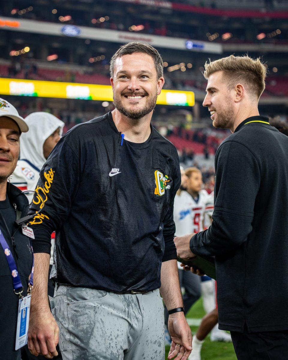 <p>A gatorade drenched Dan Lanning celebrates the Fiesta Bowl win with his staff. The Oregon Ducks crush the Liberty Flames at State Farm Stadium in Glendale, Ariz., on Jan. 1, 2024. (Jonathan Suni/Emerald)</p>