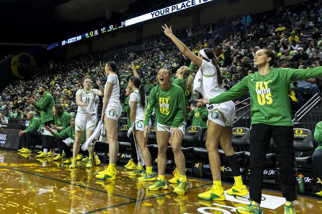 The team's bench celebrates a three-point shot from Oregon guard Chance Gray (2). The Oregon Women's Basketball Team won 65-53 against the Arizona State Sun Devils at Matthew Knight Arena in Eugene Ore., on Jan 12, 2024. (Alex Hernandez/Emerald)