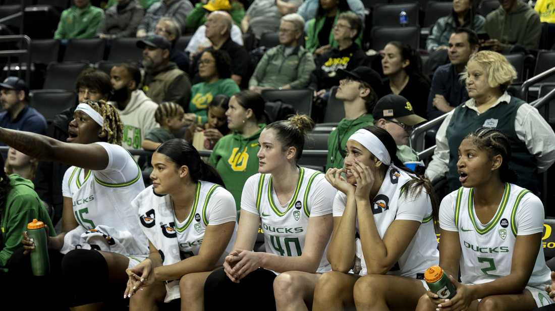 Players Phillipina Kyei (15), Uma Chamberlin (0), Grace VanSlooten (40), Sarah Rambus (23) and Chance Gray (2) watch from the Oregon bench. The Oregon Women's Basketball Team won 65-53 against the Arizona State Sun Devils at Matthew Knight Arena in Eugene Ore., on Jan 12, 2024. (Alex Hernandez/Emerald)