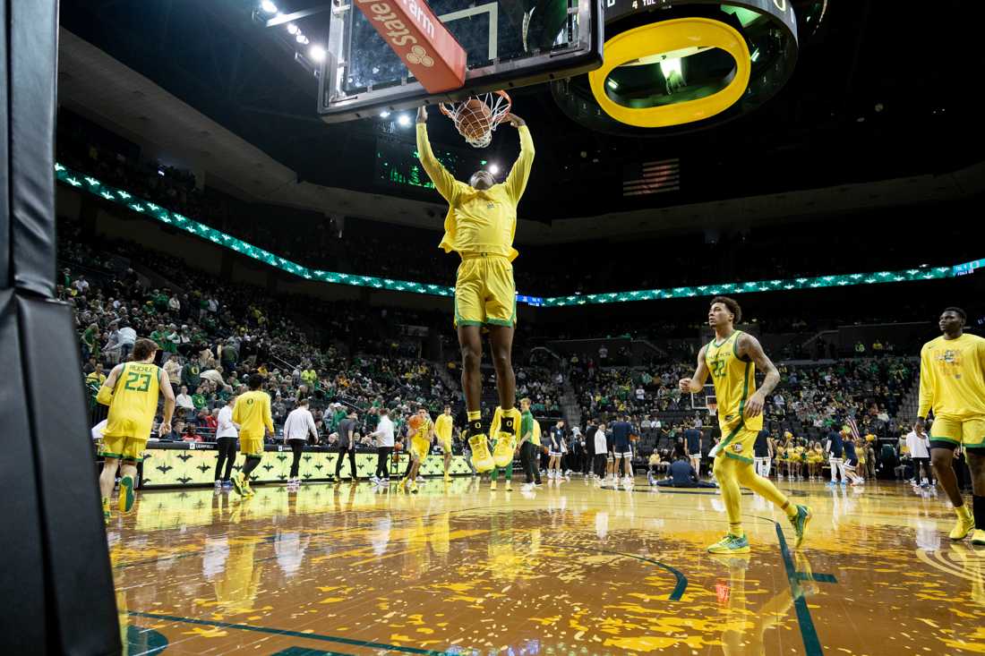 The Ducks warm up before their game against the ninth ranked Wildcats. The University of Oregon Men&#8217;s Basketball team lost to the University of Arizona Wildcats 87-78 at Matthew Knight Arena in Eugene, Ore., on Jan. 27, 2024. (Kemper Flood/ Emerald)