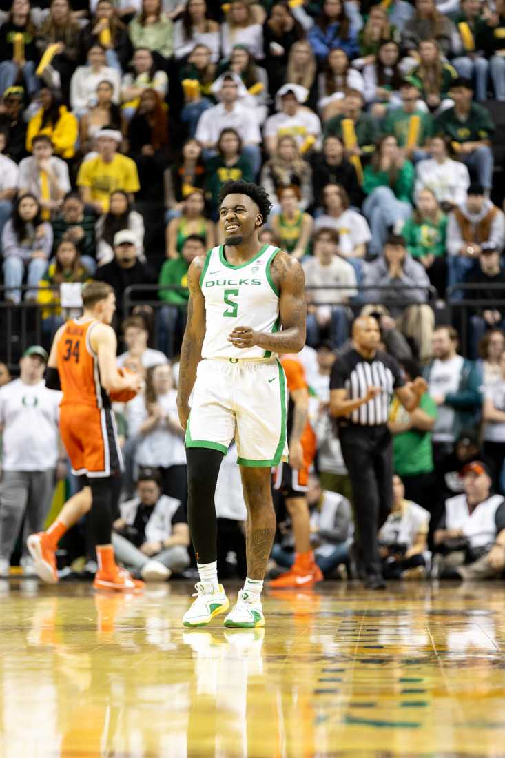 Jermaine Couisnard (5) celebrates a two point play by the Ducks in the back court. The Oregon Men&#8217;s Basketball team beat Oregon State University 78-71 at Matthew Knight Arena in Eugene, Ore., on Feb. 28, 2024. (Kemper Flood/ Emerald)