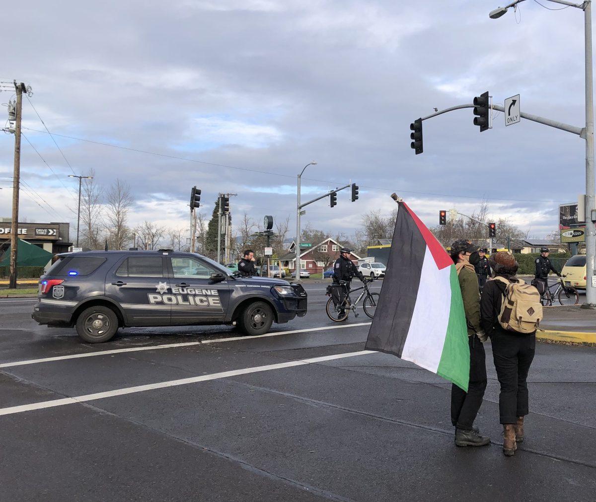 The Eugene Police Department blocks protestors' access to Franklin Blvd. on Jan. 20, 2023. (Mathias Lehman-Winters/Emerald)