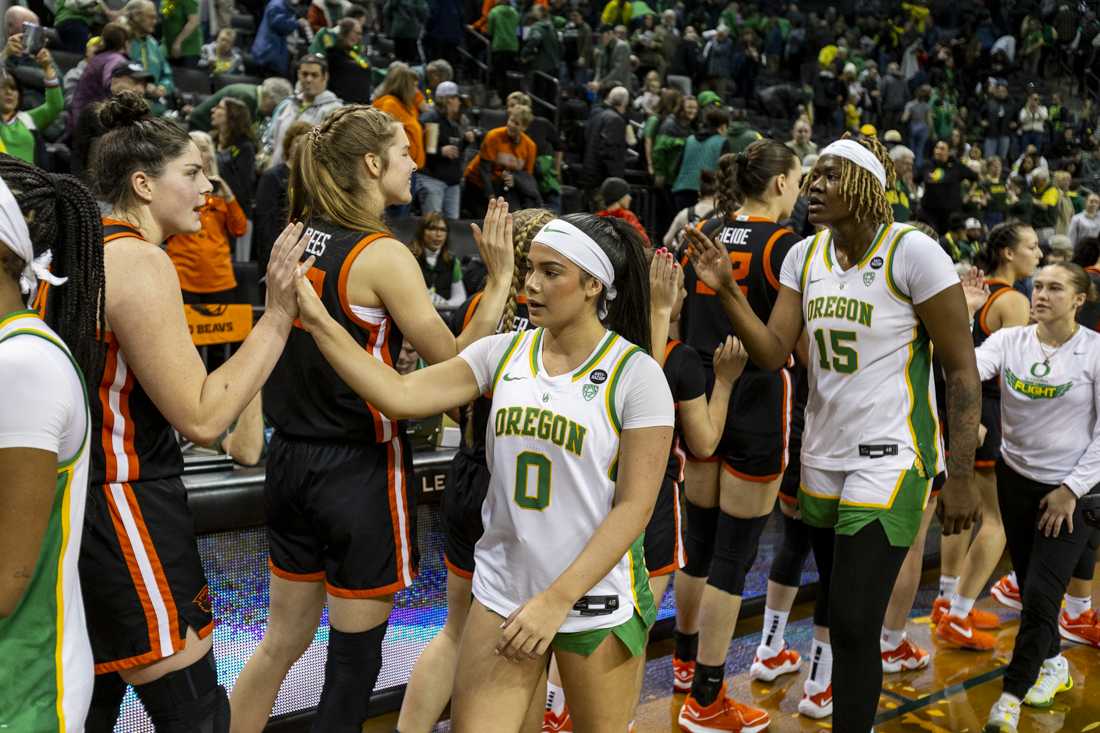 <p>Ducks and Beavers high five after the game. After a close second half, the Ducks lost their rivalry matchup 64-60 to the Beavers in Matthew Knight Arena on Feb. 4, 2024. (Alex Hernandez/Emerald)</p>