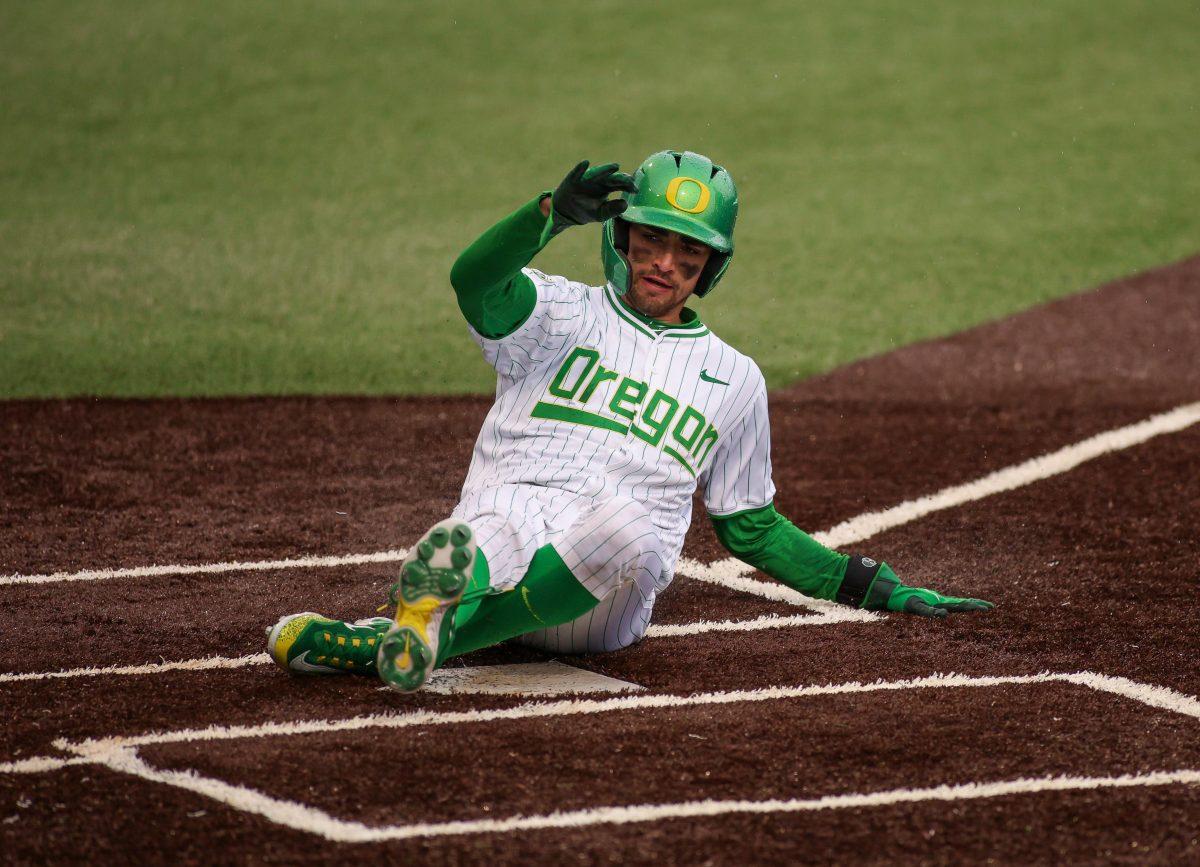 Carter Garate (3) slides into home in the bottom of the 6th, extending Oregon&#8217;s lead. Oregon Baseball take on UC Santa Barbara at PK Park in Eugene, on March 3 , 2024. (Eddie Bruning/Emerald)