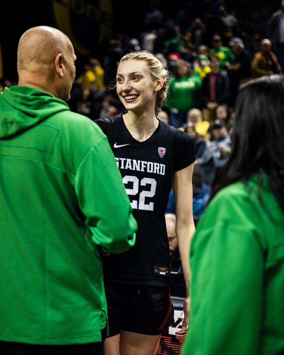 Both teams meet to show their respect to each other after the game. Oregon coach, Kelly Graves, takes some extra seconds to give a special message to the Cardinal's star center, Cameron Brink (22).&#160;The Oregon&#160;Women's&#160;Basketball team host #4 Stanford at Matthew Knight Arena in Eugene, Ore., on March 2, 2024. (Jonathan Suni/Emerald)