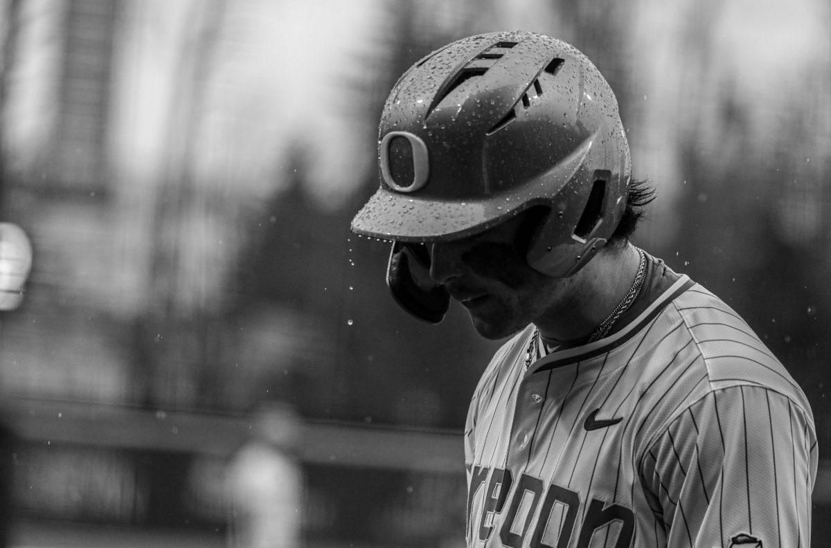 Mason Neville (26) walks up to the on-deck circle during Oregon&#8217;s 6th inning rally where they erupted for 9 runs. The Oregon Ducks Baseball team defeat UC Santa Barbara 16-9 in Game 3 of the series at PK Park in Eugene, Ore., on March 3, 2024. (Kai Kanzer/Emerald)