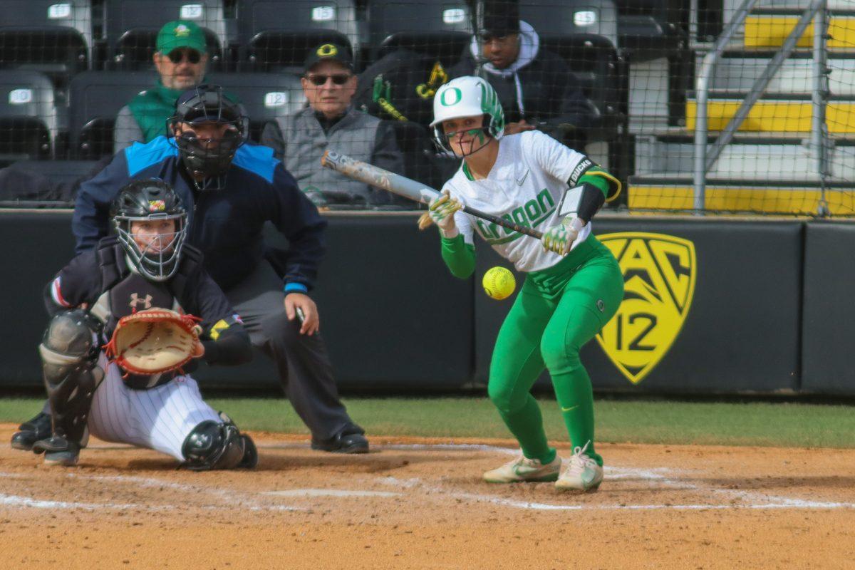 Paige Sinicki (38) going for a bunt. The Oregon Softball team came out on top in their second game against Maryland 4-2 in the Jane Sanders Classic hosted in Eugene, Ore., on March 2, 2024, at Jane Sanders Stadium. (Alyssa Garcia/Emerald)