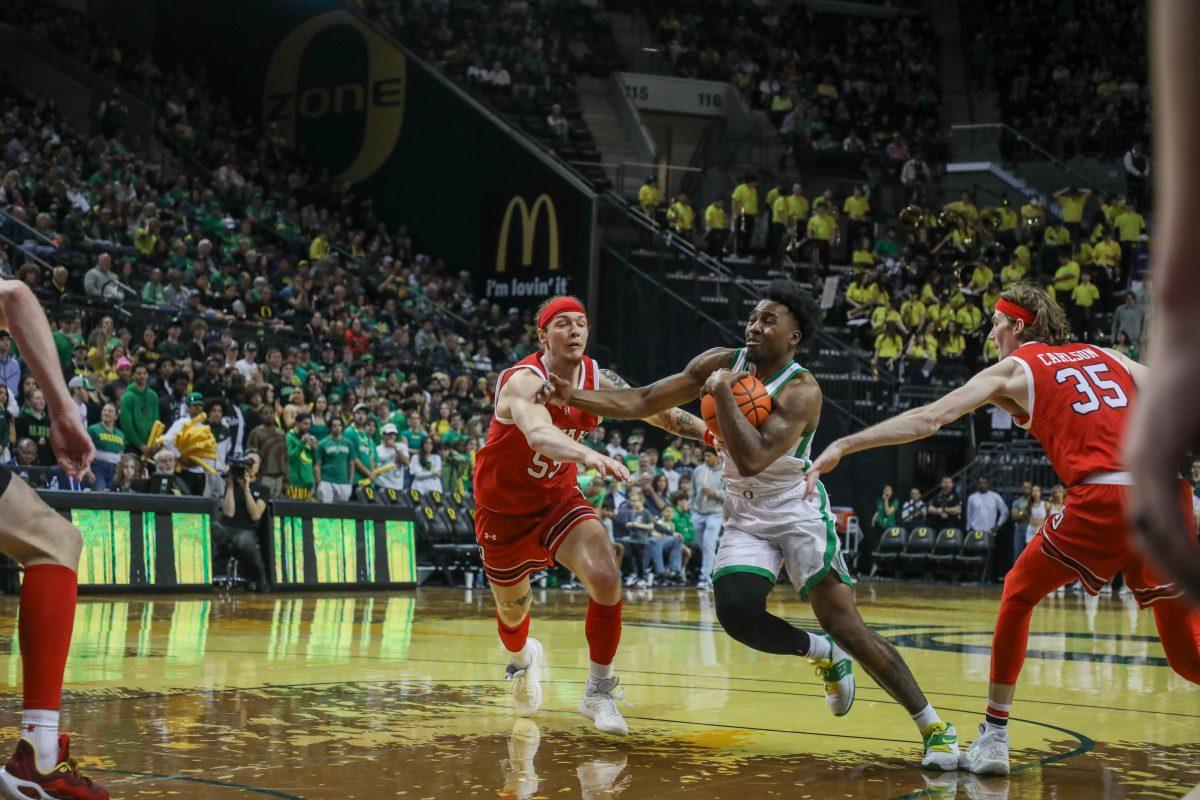 Jermaine Couisnard (5) drives the lane. Oregon Men&#8217;s Basketball beat Utah 66-65 on senior night at Matthew Knight Arena in Eugene, Ore., on March 9, 2024. (Kai Kanzer/Emerald)