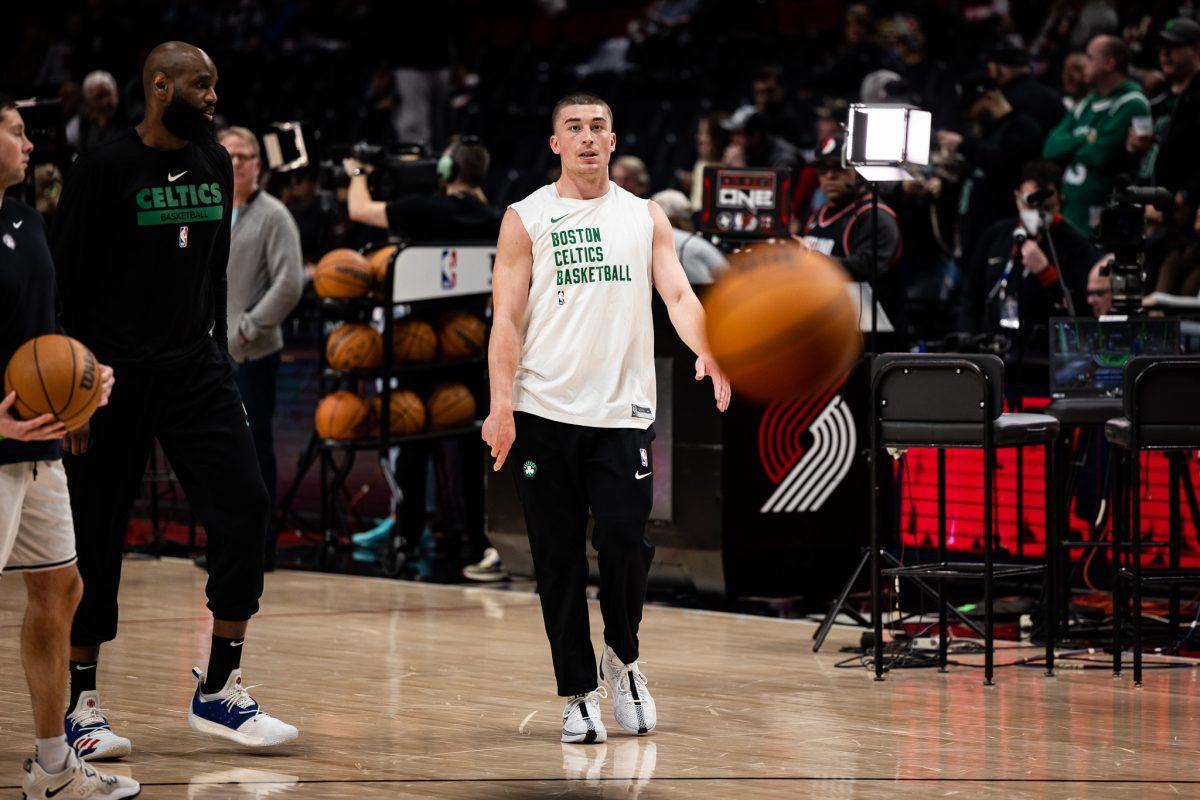 Payton Pritchard (11) stops by his home state to play the Portland Trailblazers wearing the new Nike Sabrina Ionescu basketball shoes to represent his fellow "pro duck".&#160;The Portland Trailblazers host the Boston Celtics at the Moda Center in Portland, Ore., on March 11, 2024. (Jonathan Suni/Emerald)