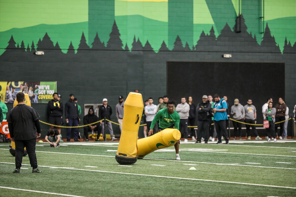 Brandon Dorlus works out at Pro Day. Oregon Ducks prepare for the NFL Draft at their Pro Day 2024. (Kai Kanzer/Emerald)