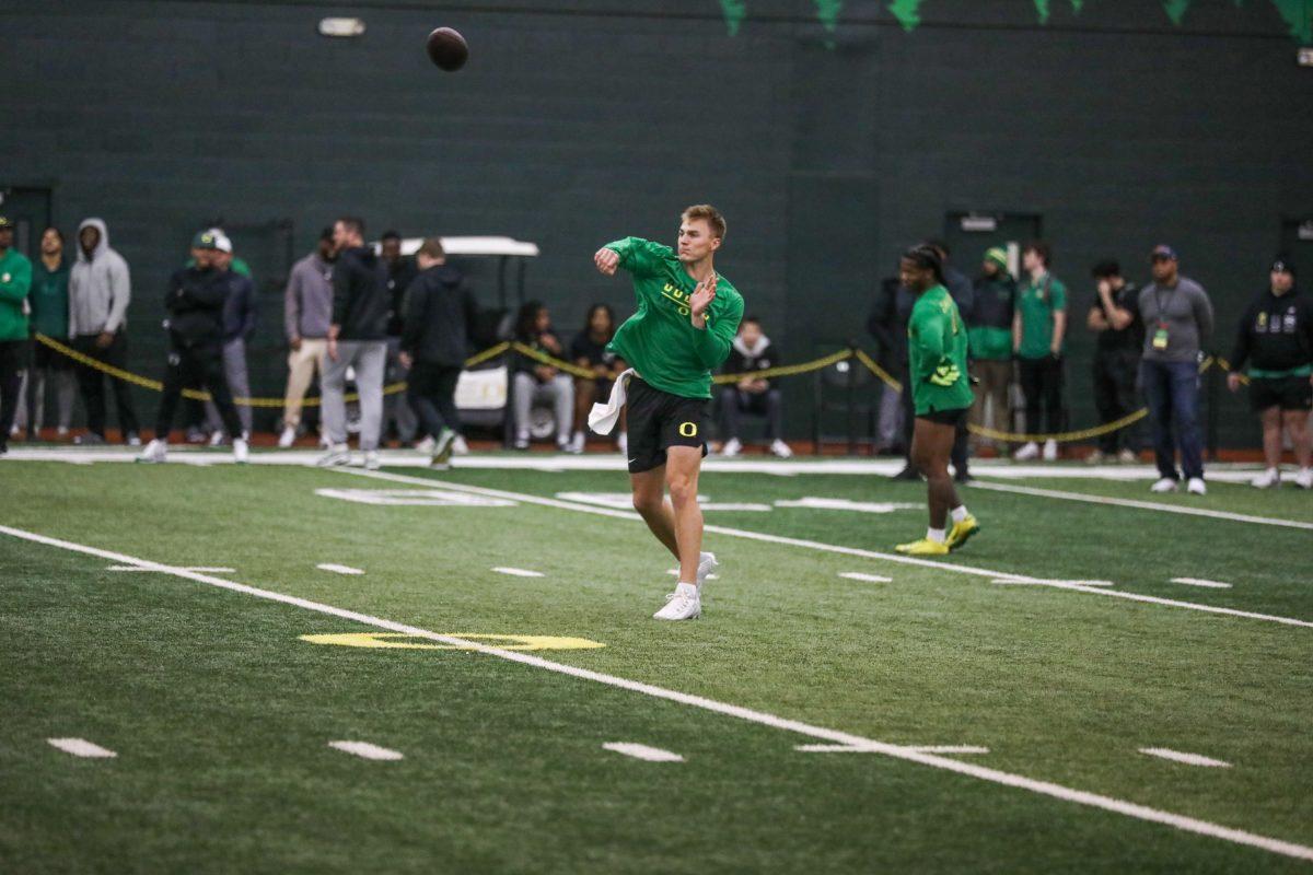 Bo Nix (10) throws during the 2024 Pro Day. (Kai Kanzer/Emerald)