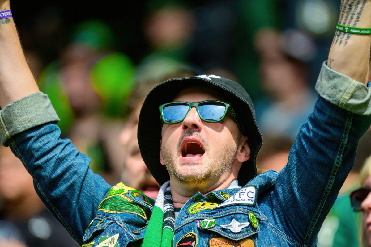 A Timbers fan participates in a chant directed toward the visiting LAFC players. The Portland Timbers FC tied 2-2 with Los Angeles FC in a regular season MLS match at Providence Park in Portland, Ore., on April 13, 2024. (Eric Becker/Emerald)