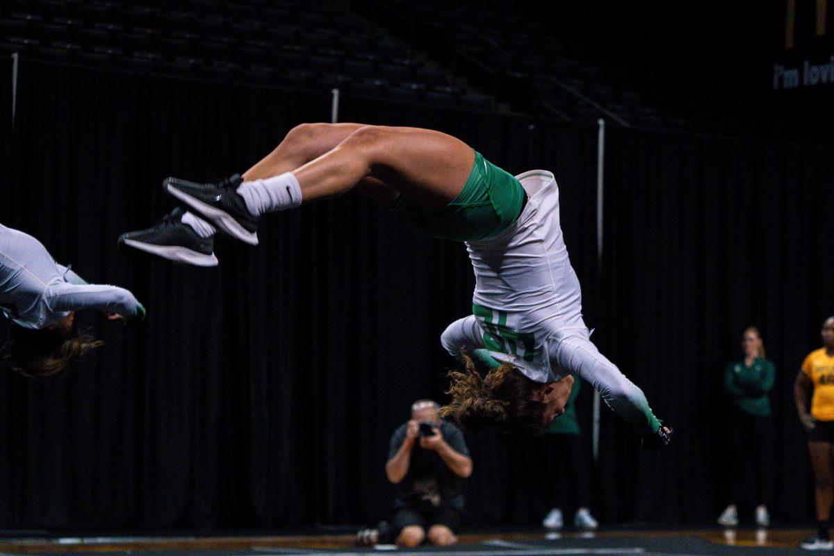 The University of Oregon Ducks Acrobatics and Tumbling Team played the University of Baylor Bears in a home match at Matthew Knight Arena in Eugene, Ore., on Apr. 5, 2024. (Spencer So/Emerald)