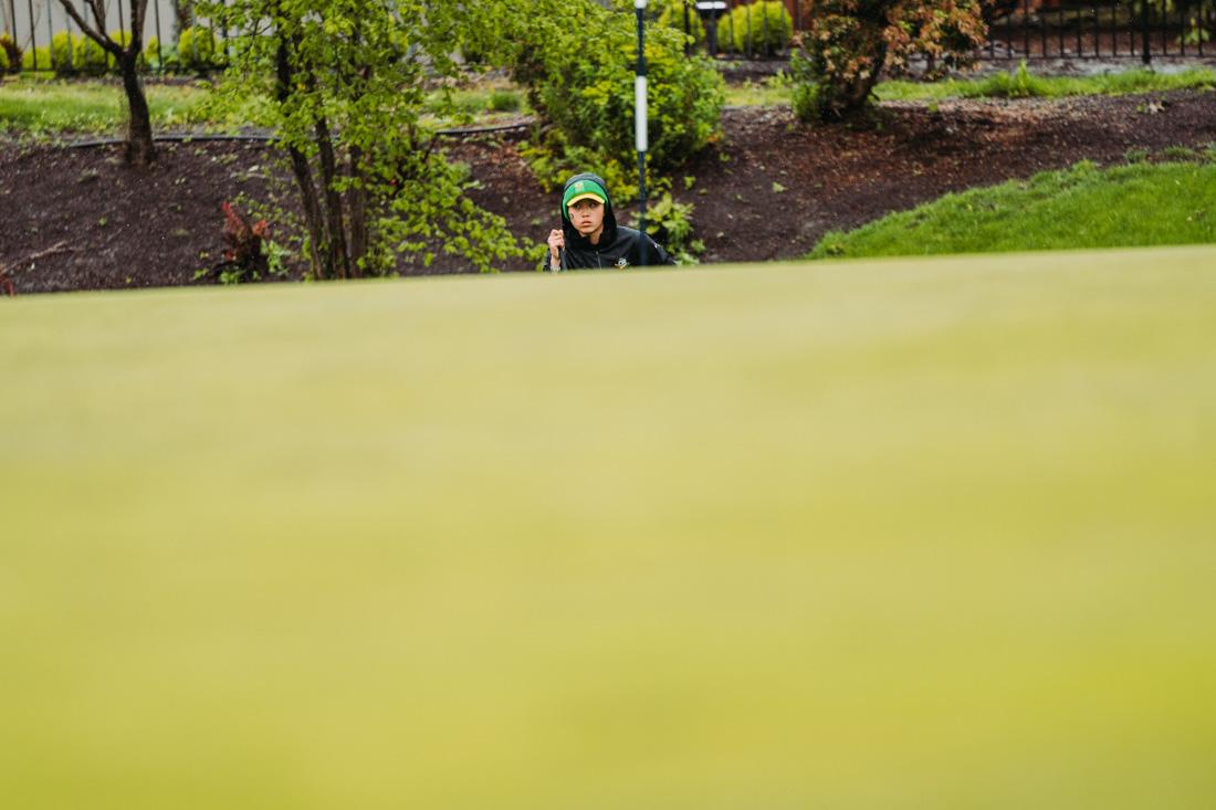 Oregon's Hsin-Yu (Cynthia) Lu, waits for her turn to chip shot onto the green. The Eugene Country Club hosted the Pac-12 Women's golf championships from April 18-20, 2022. (Serei Hendrie/ Emerald)