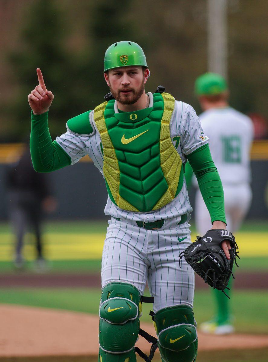 Catcher Bennett Thompson (16) signaling for the first out of the inning. Oregon Baseball take on UC Santa Barbara at PK Park in Eugene, on March 3 , 2024. (Eddie Bruning/Emerald)