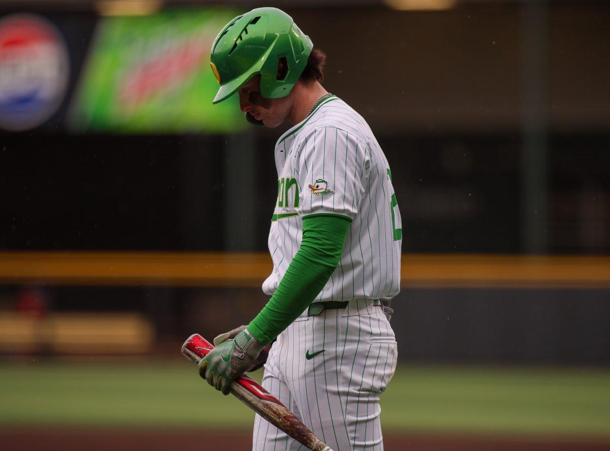 Mason Neville (26) steps into the batters box in the bottom of the first. Oregon Baseball take on UC Santa Barbara at PK Park in Eugene, on March 3 , 2024. (Eddie Bruning/Emerald)