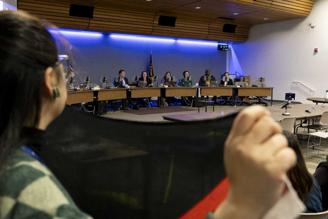 Attendees of the meeting hold a Palestinian flag. People attended the April 3, 2024 Eugene 4J School Board meeting showing their support for Spencer Butte Middle School math teacher Jenoge Sora Khatter, who was directed to remove a Palestinian flag from his classroom by a district administrator, or face consequences up to and including termination. (Alex Hernandez/Emerald)