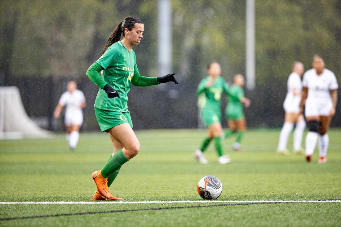 Kristen Conti (14) dribbles the ball to push the offense for the Ducks. University of Oregon women's soccer team defeated Oregon tech to kickoff the start of their Spring season at Pape Field in Eugene, Ore., on April 16, 2024. (Kemper Flood/ Daily Emerald)