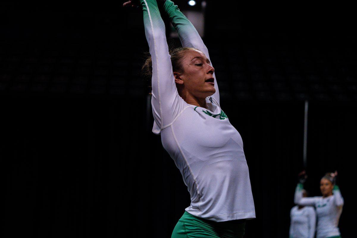 The University of Oregon Ducks Acrobatics and Tumbling Team played the University of Baylor Bears in a home match at Matthew Knight Arena in Eugene, Ore., on Apr. 5, 2024. (Spencer So/Emerald)