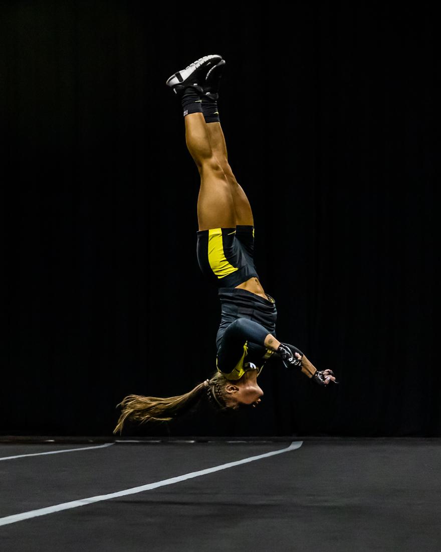 Karly Nowak (20) flips upside down during her tumbling heat. The Oregon Acrobatics and Tumbling team takes on Baylor on April 10th, 2022, at Matthew Knight Arena. (Molly McPherson/Emerald)