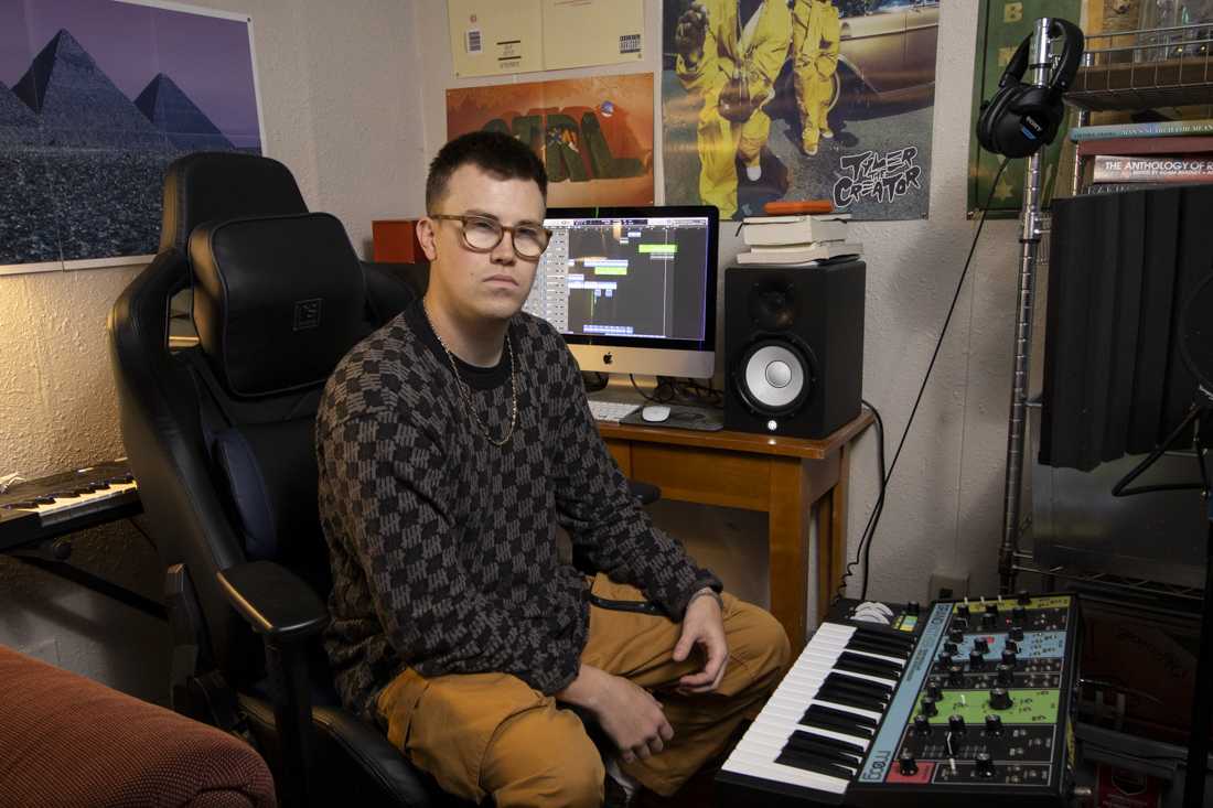 Andrew Kai, a local musician, poses for a portrait in his home studio on April 25, 2024. (Alex Hernandez/Emerald)