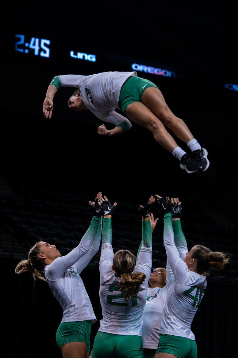 The University of Oregon Ducks Acrobatics and Tumbling Team played the University of Baylor Bears in a home match at Matthew Knight Arena in Eugene, Ore., on Apr. 5, 2024. (Spencer So/Emerald)