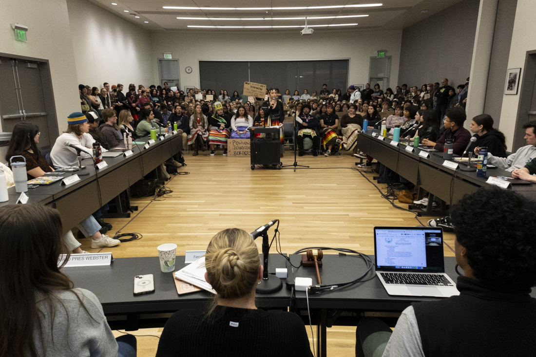 <p>Tiera Garrety, a co-director of the Native American Student Union, gives a speech to the ASUO senate at its meeting on March 13, 2024. Over 150 students and community members protested the decision made by the ASUO to schedule the spring concert on the same weekend as the 56th Annual Mother's Day Powwow, a community and cultural event planned by the Native American Student Union. (Alex Hernandez/Emerald)</p>