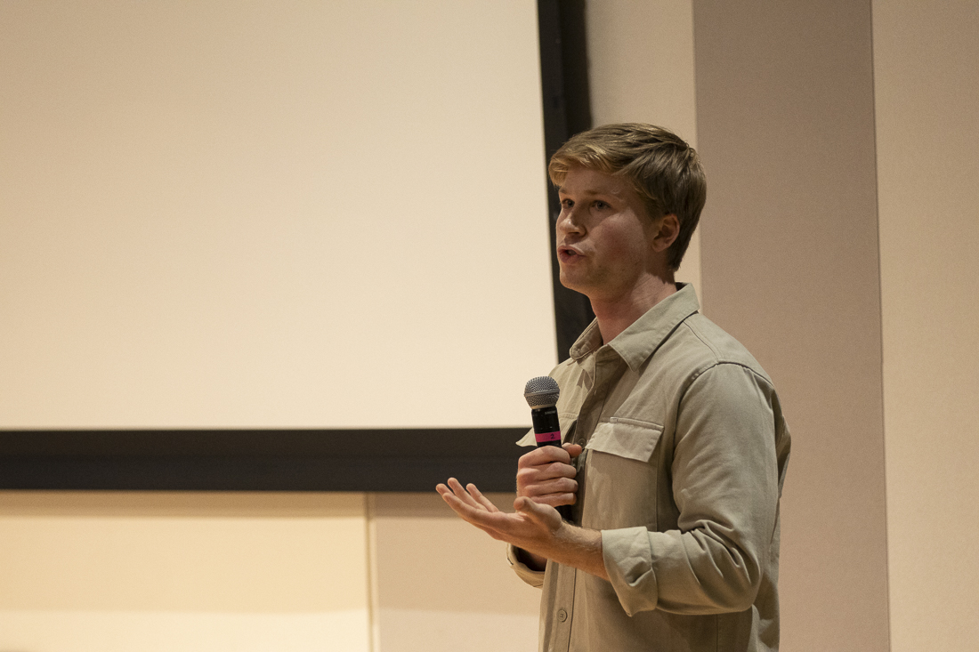 Robert Irwin speaks to his audience on May 24, 2024. Students filled the EMU Redwood Auditorium to listen to Australian conservationist Robert Irwin speak as a part of UO CAER's 29th Annual Environmental Justice Conference; Irwin discussed topics ranging from wildlife conservation efforts and research to koala chlamydia and how to trap a crocodile. "To make change is really difficult," he said. "But to not make change is deadly." (Alex Hernandez/Emerald)