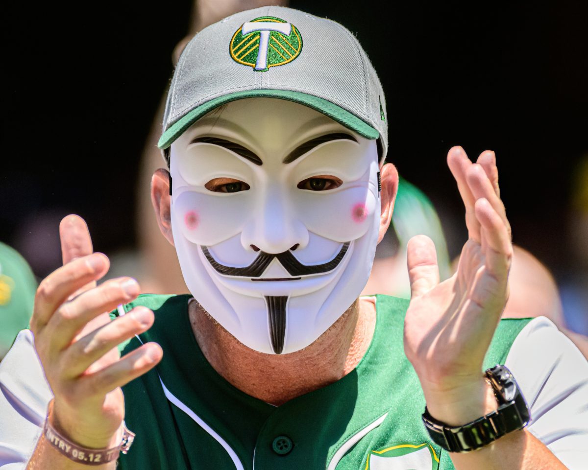 A member of the Timbers Army supporters group claps as the Timbers take the field for warmups. Seattle Sounders FC defeated Portland Timbers FC 2-1 in a regular season MLS match at Providence Park in Portland, Ore., on May 12, 2024. (Eric Becker/Emerald)