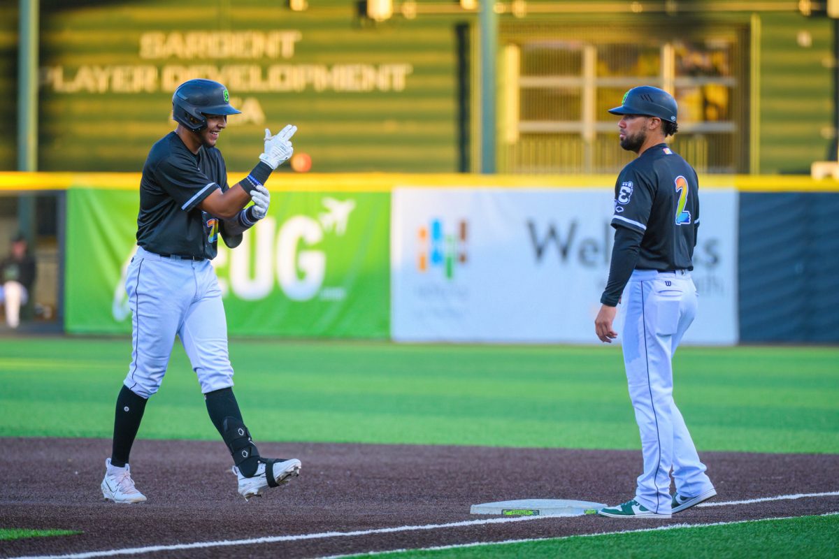 Victor Bericoto celebrates after getting on base. The Eugene Emeralds beat the Vancouver Canadians by a final score of 2-1 at P.K. Park in Eugene, Oregon, on June 23, 2023. (Eric Becker/Emerald)