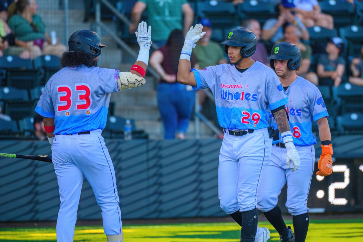 Victor Bericoto (29) is congraulated by Luis Toribio (33) after his home run. The Eugene Emeralds lost to the Vancouver Canadians by a final score of 13-2 at P.K. Park in Eugene, Oregon, on June 22, 2023. (Eric Becker/Emerald)