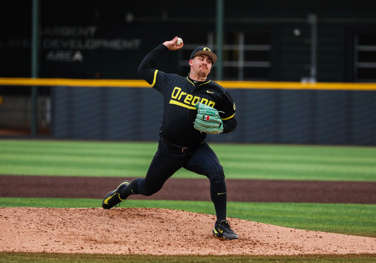 Pitcher Logan Mercado pitches during the 4th inning of Saturday&#8217;s loss versus UC Santa Barbara. Mercado has the Mexican flag on his glove representing his heritage. UC Santa Barbara defeats the Oregon Baseball team 7-3 in Game 2 of the series at PK Park in Eugene, Ore., on March 2, 2024. (Kai Kanzer/Emerald)