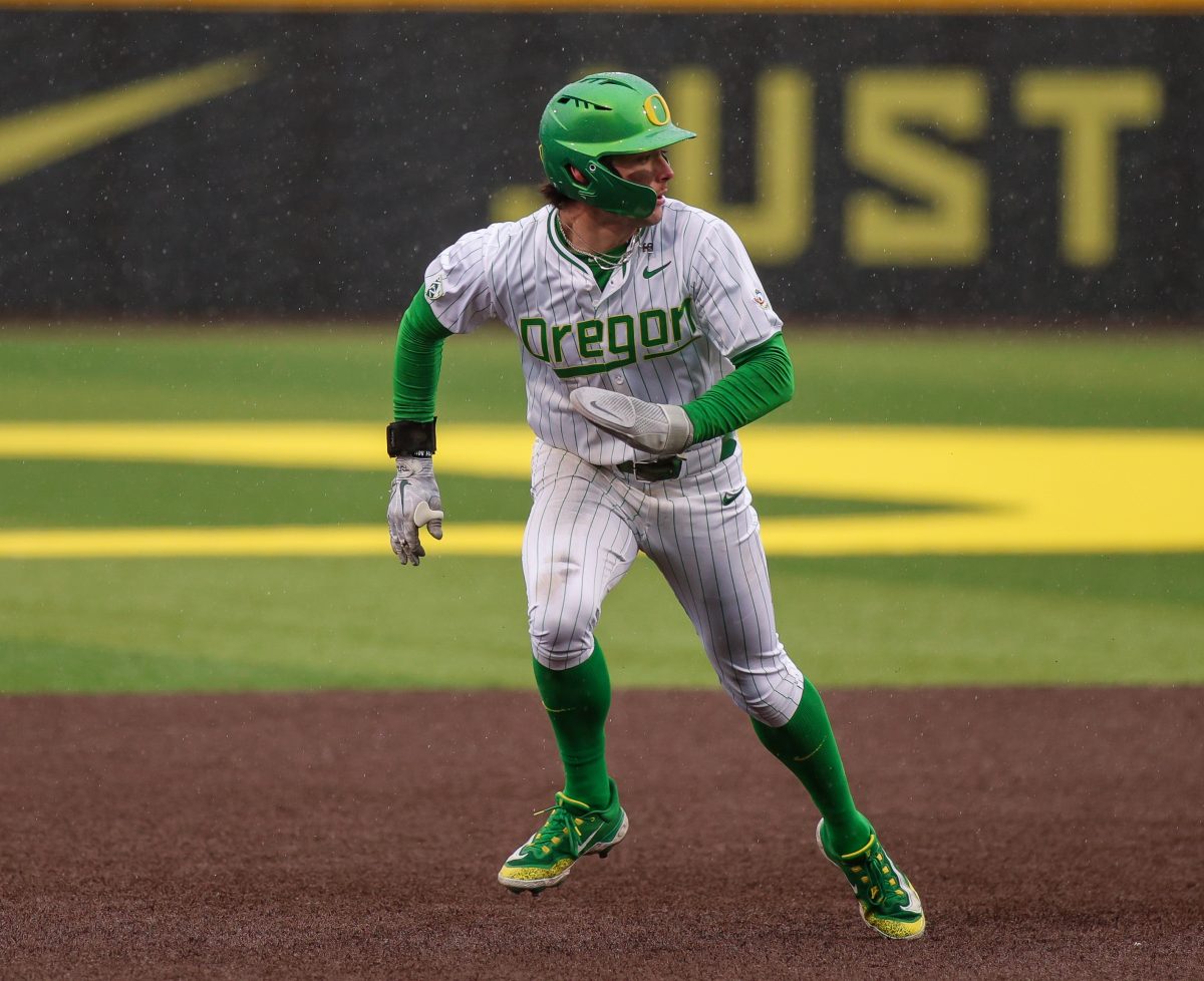 Mason Neville (26) takes off to third after a foul tip in the bottom of the 6th. Oregon Baseball take on UC Santa Barbara at PK Park in Eugene, on March 3 , 2024. (Eddie Bruning/Emerald)