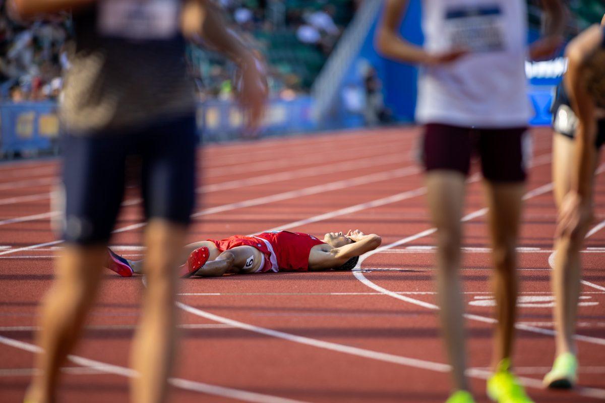 An athlete is left behind as the distance runs begin at a hot and sunny point in the day.&#160;The top athletes in college track and field meet in the iconic Hayward Field for the NCAA Championships in Eugene, OR, from June 5th to June 8th, 2024. (Jonathan Suni, Emerald)