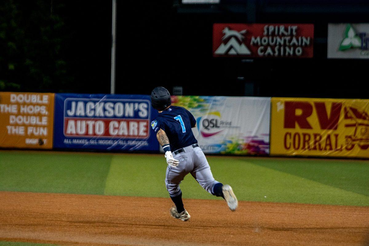 Kaden Polcovich (7) flies through first base on his way to hitting a triple. The Eugene Emeralds suffered a major 10-2 defeat at the hands of the Everett AquaSox on Wednesday, July 7 at PK Park in Eugene, Oregon. (Will Geschke/Emerald)