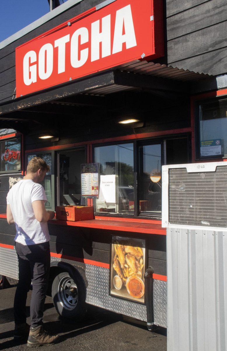 A customer orders at Gotcha Burger in Eugene, Ore. (Alyssa Garcia/Emerald)