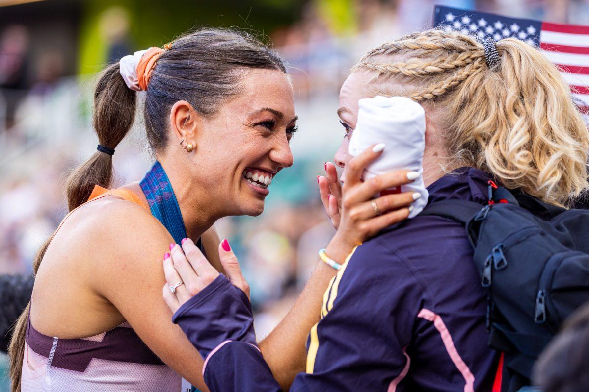 Courtney Wayment celebrates with her fellow Adidas teammates as she earns her spot in the women's 3000m steeplechase.&#160;The most elite athletes in the country meet at Hayward Field for the 2024 Summer Olympic Trials in Eugene, Ore. on June 22, 2024. (Jonathan Suni/Emerald)