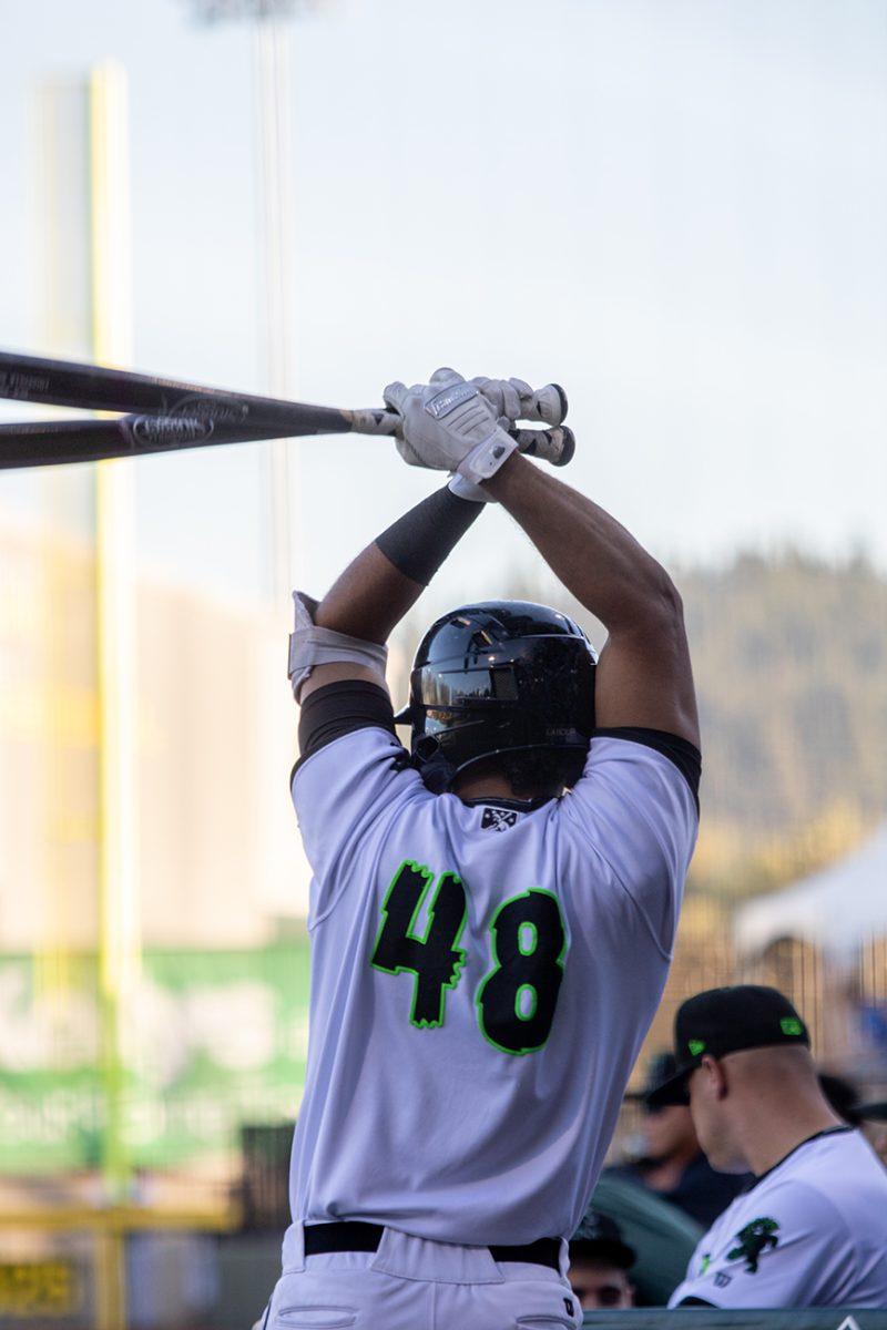 Franklin Labour (48) warms up using two bats before hitting. The Eugene Emeralds suffered a major 10-2 defeat at the hands of the Everett AquaSox on Wednesday, July 7 at PK Park in Eugene, Oregon. (Will Geschke/Emerald)